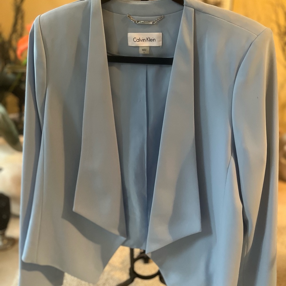 Blazer  Designer: Calvin Klein Color:sky blue